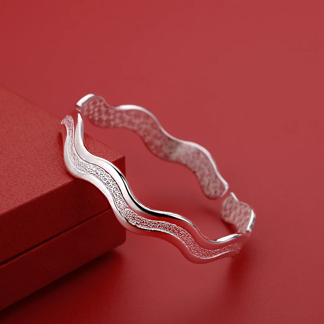 Bransoletka Srebrna z motywem fal i gwiazd