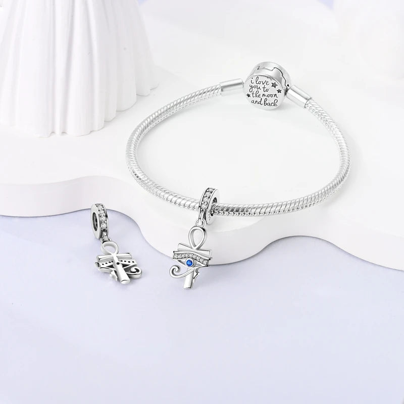 Zawieszka Srebrna w Kształcie Krzyża Ankh i Oka Horusa.